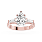 Rose gold ring with a large diamond and smaller diamonds on a white background