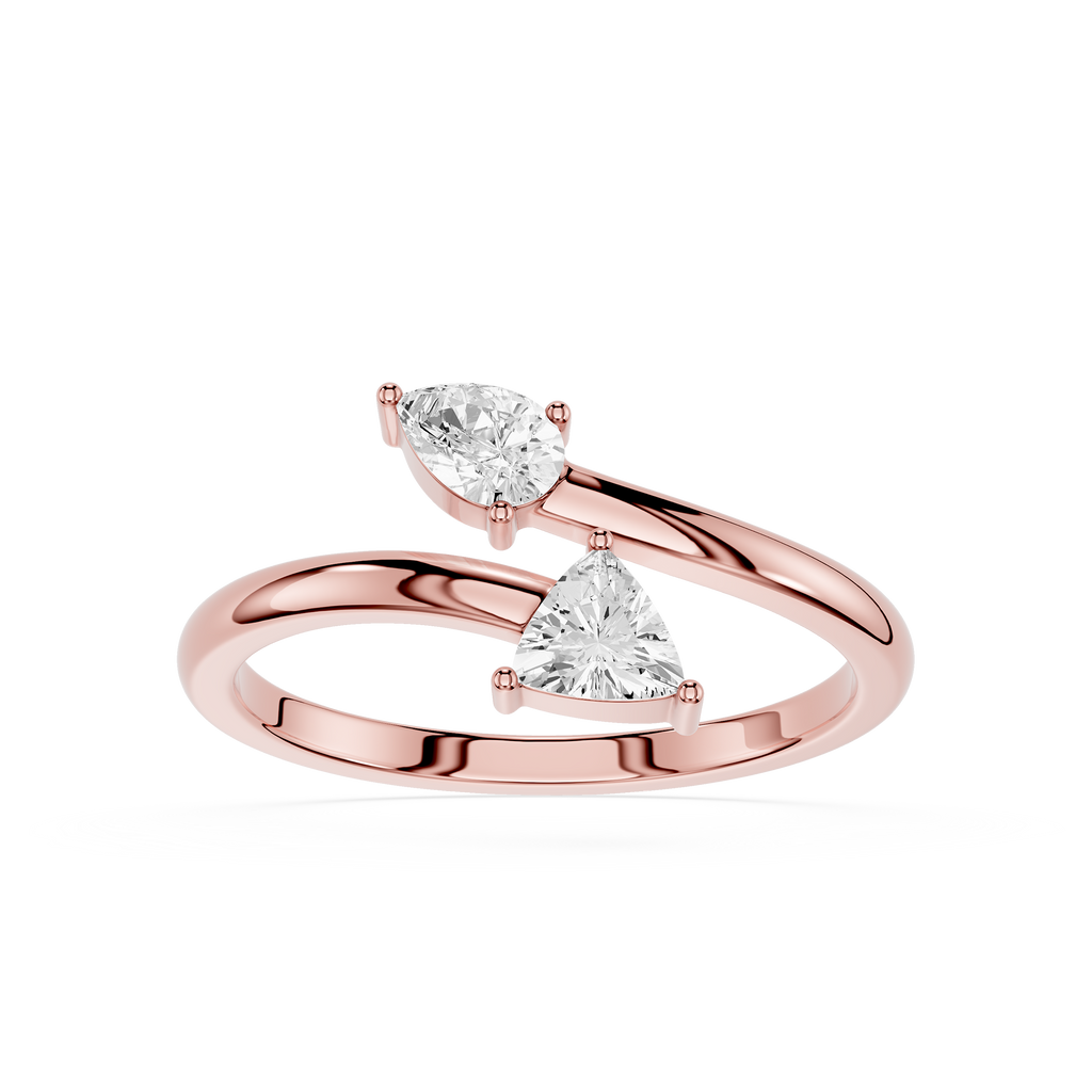A rose gold ring with two triangular-cut clear gemstones, set against a clean white background.