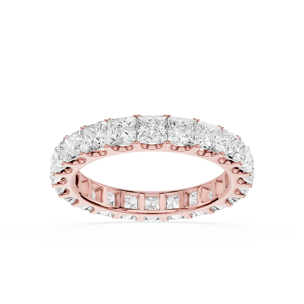 A rose gold eternity ring featuring a continuous row of round brilliant-cut diamonds on a clean white background.