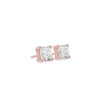 Rose gold stud earrings with clear gemstones on a white background