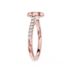 A rose gold diamond ring with a pavé band featuring a row of clear round-cut diamonds and a triangular diamond accent, set against a plain white background.