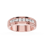 Rose gold ring with diamonds on a white background