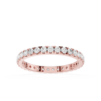 Rose gold ring with diamonds on a white background