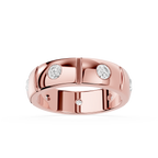 Rose gold ring with diamonds on a white background