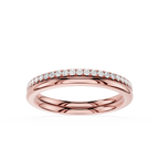 A rose gold eternity band ring featuring a row of small, round-cut clear gemstones set along the top edge, shown on a clean white background.