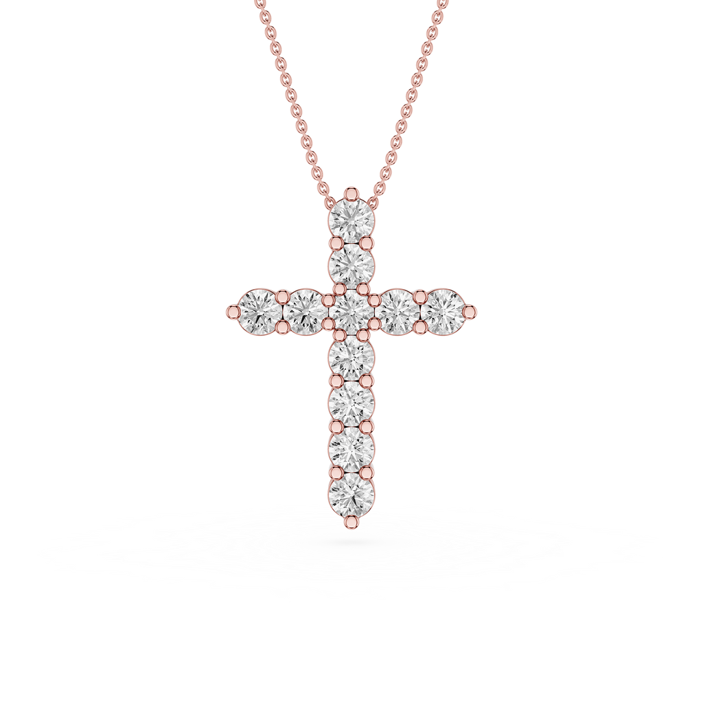 Rose gold and silver cross pendant necklace on a white background