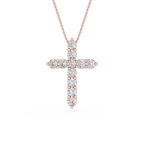 Rose gold and silver cross pendant necklace on a white background