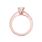 Rose gold ring with a diamond on a white background