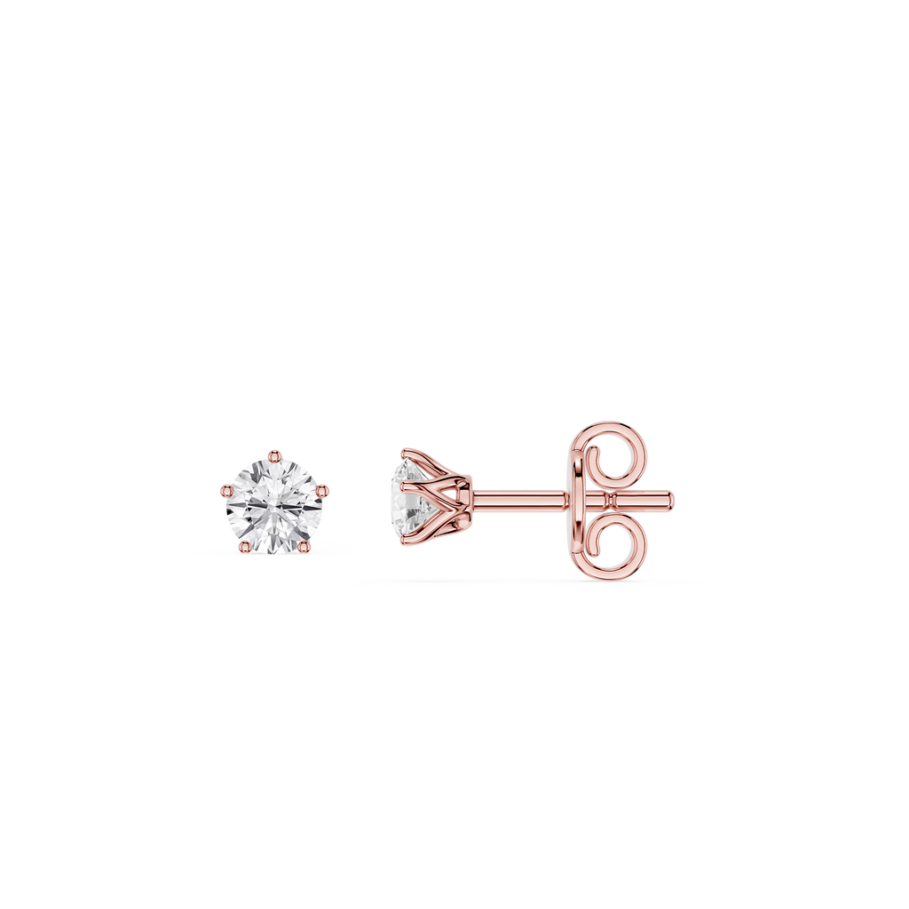 Rose gold diamond stud earrings on a white background