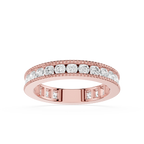 Rose gold ring with diamonds on a white background