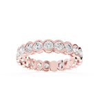 Rose gold round cut lab grown diamond eternity wedding band featuring scalloped bezel settings and a continuous diamond row
