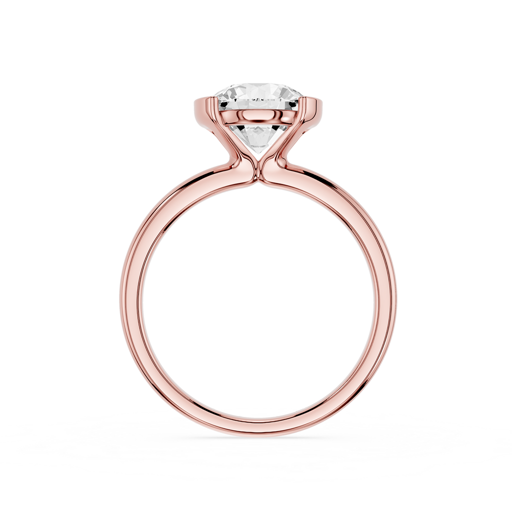 Rose gold ring with a diamond on a white background