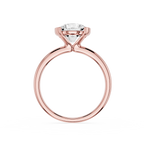 Rose gold ring with a diamond on a white background