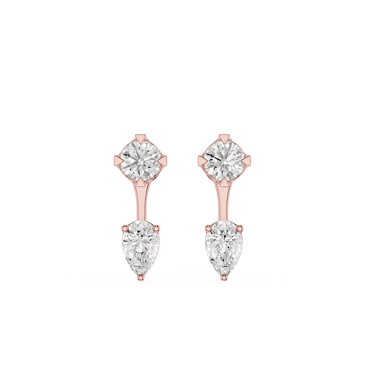 Rose gold earrings with clear gemstones on a white background