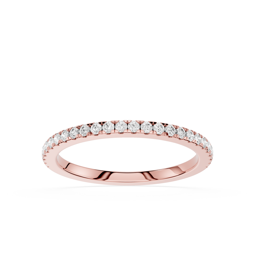 Rose gold ring with diamonds on a white background