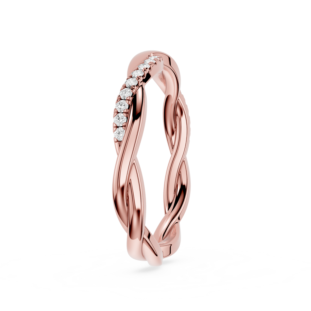 Rose gold ring with diamond accents on a white background