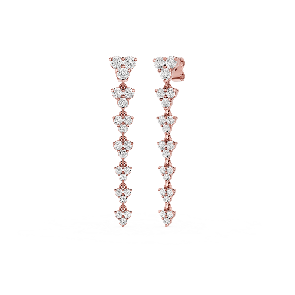 Rose gold and diamond earrings on a white background