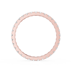 Rose gold ring with small stones on a white background
