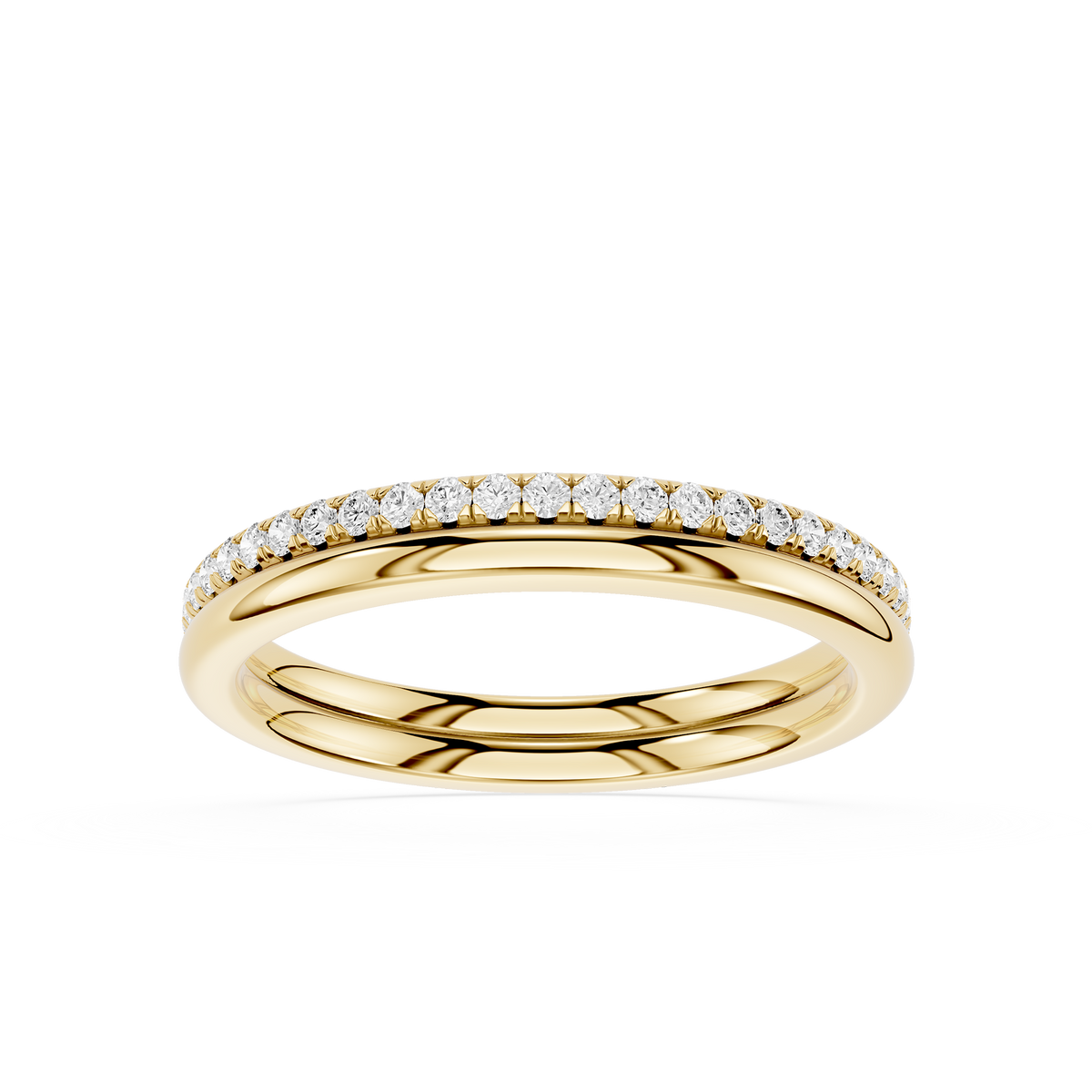 A yellow gold eternity ring featuring a single row of round-cut clear lab-grown diamonds set along the top half of the band.