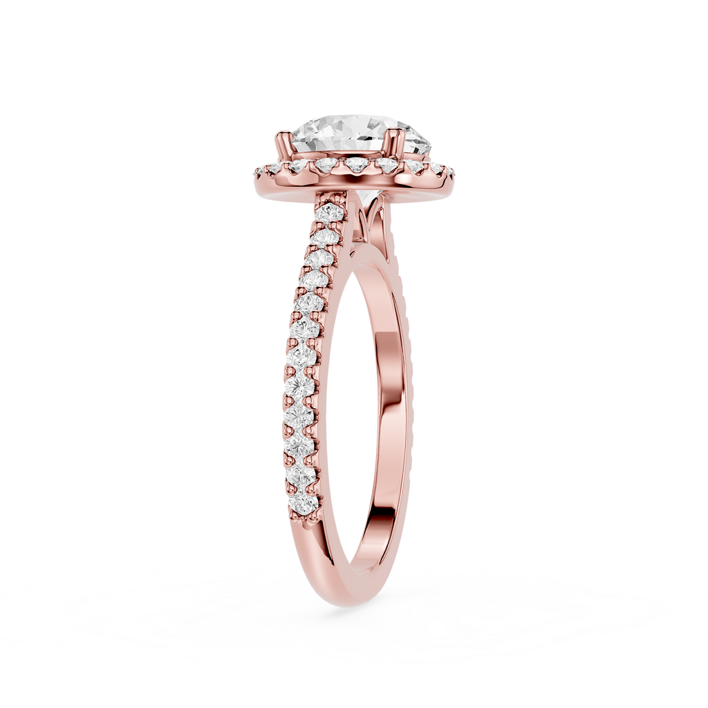Rose gold ring with a diamond on a white background
