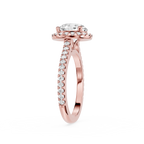 Rose gold ring with a diamond on a white background