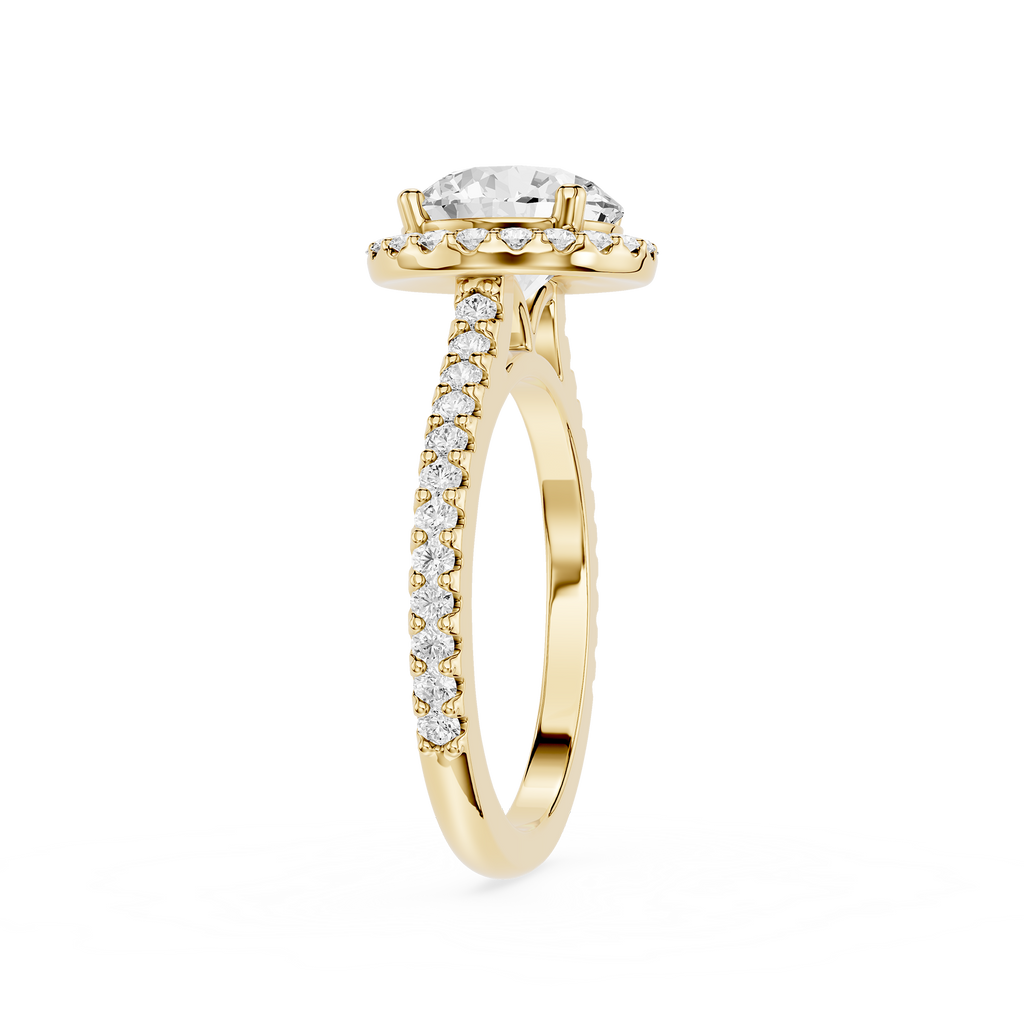 Gold ring with a diamond on a white background