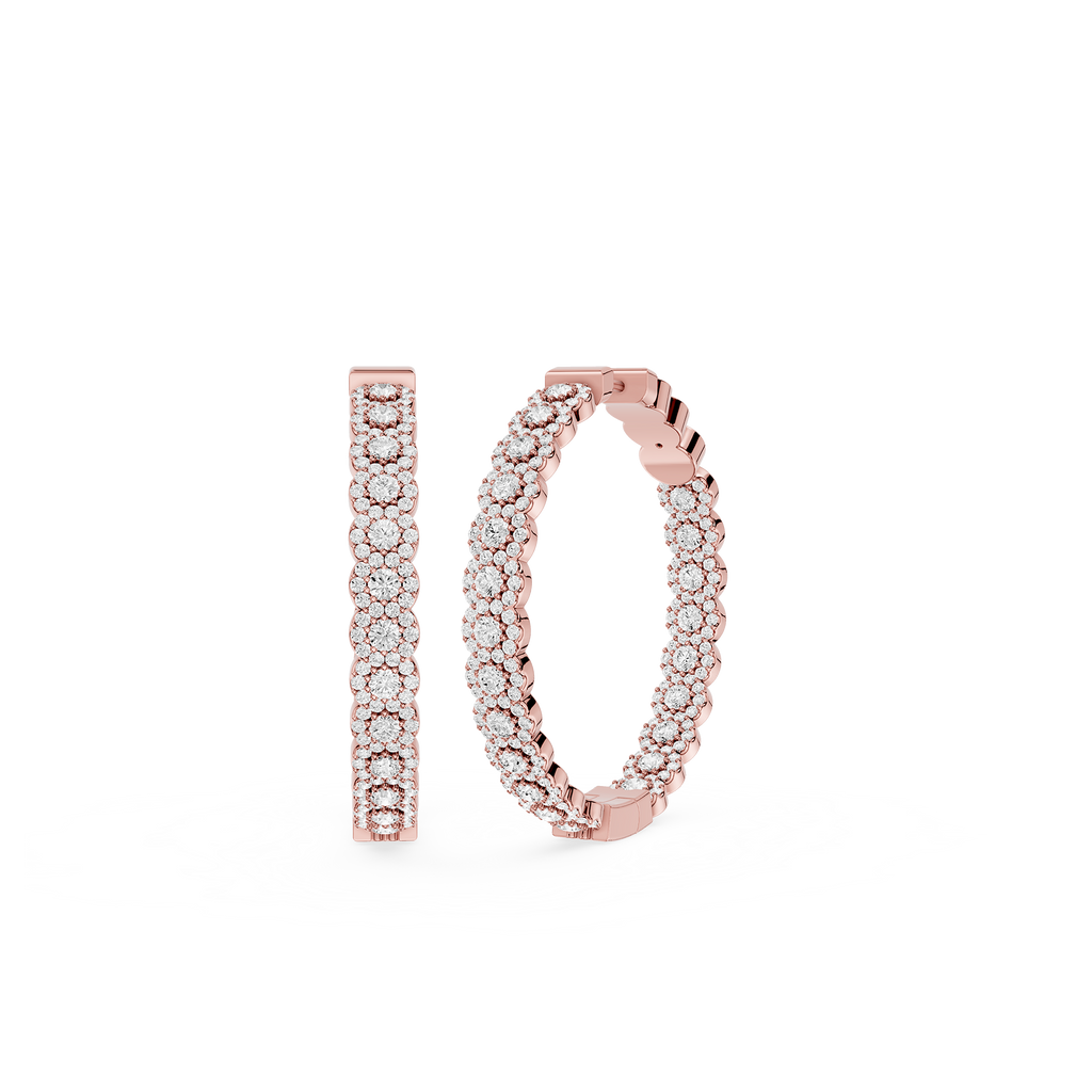 Rose gold hoop earrings with clear gemstones on a white background