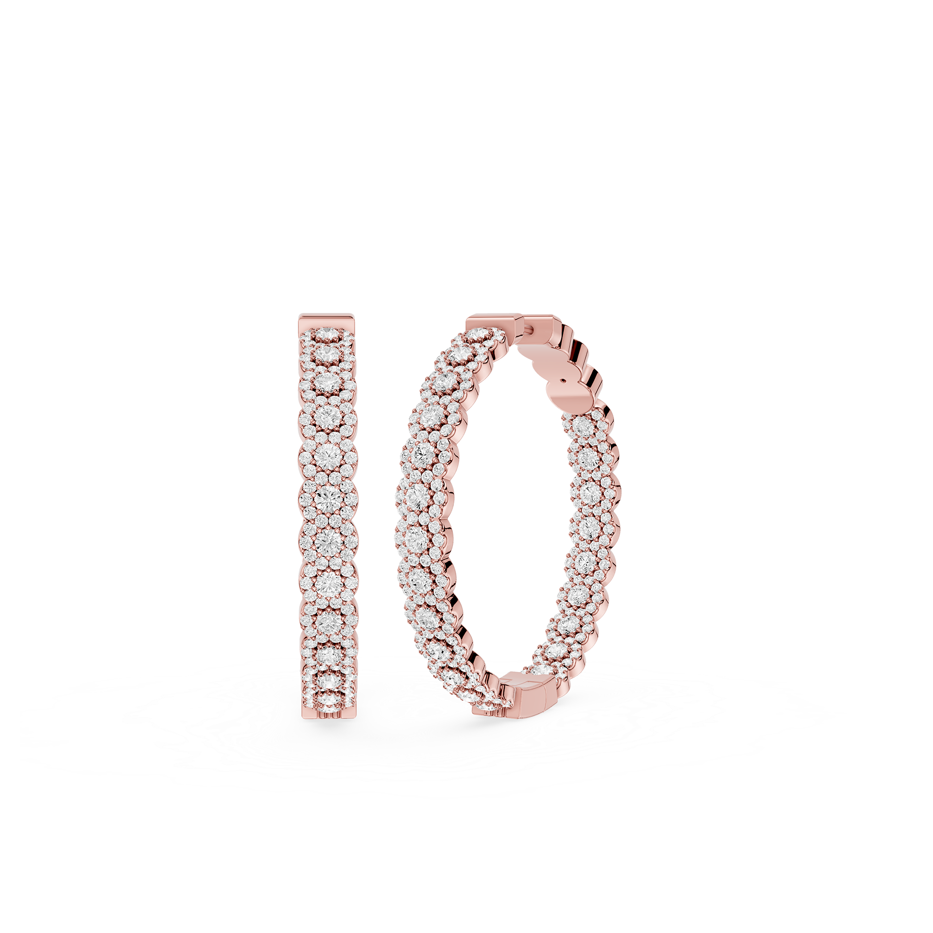 Rose gold hoop earrings with clear gemstones on a white background