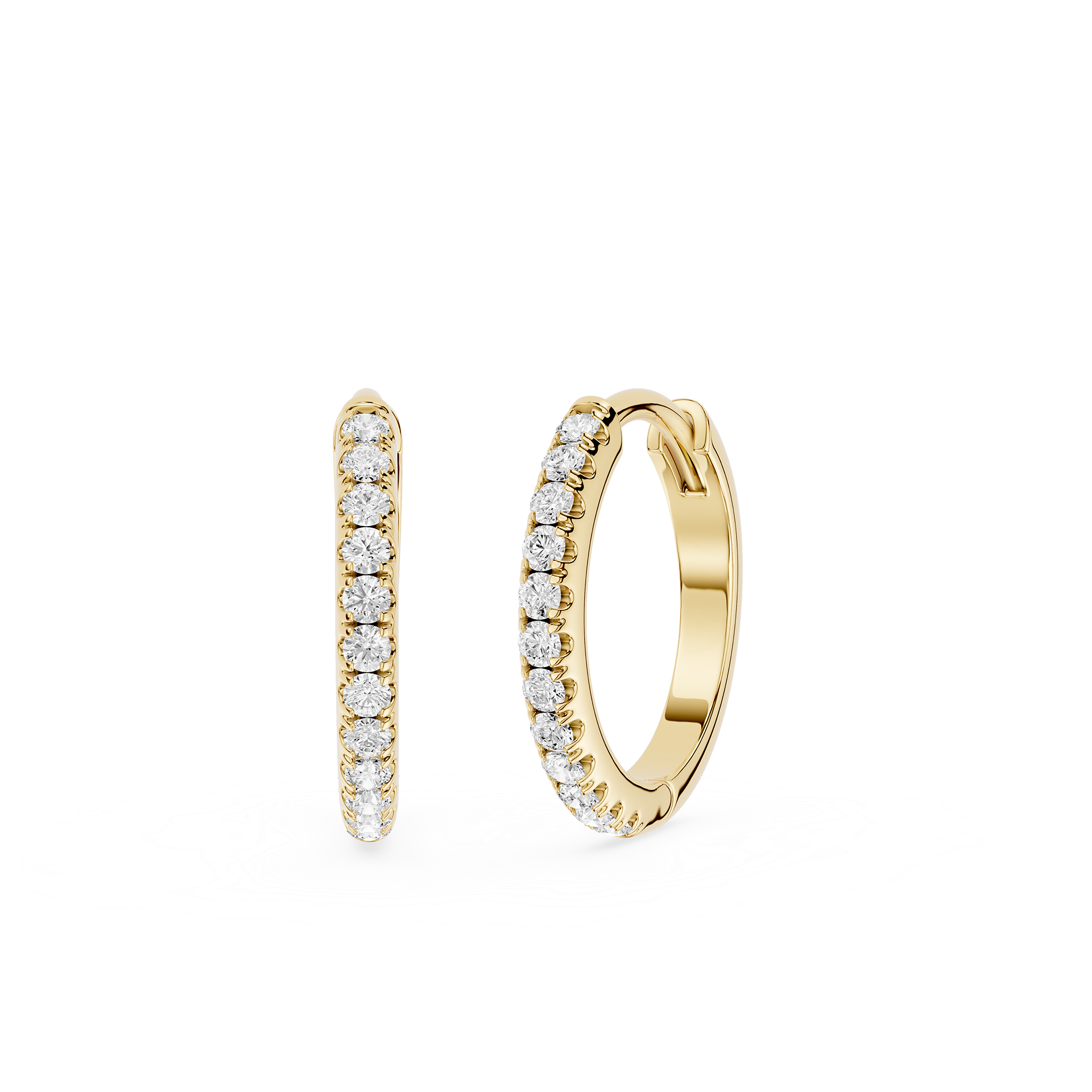Gold hoop earrings with embedded diamonds on a white background