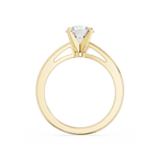 Gold ring with a diamond on a white background