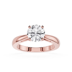 Rose gold ring with a large diamond on a white background
