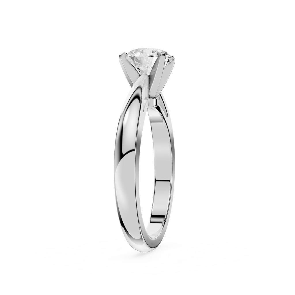Silver ring with a diamond on a white background