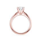 Rose gold ring with a diamond on a white background