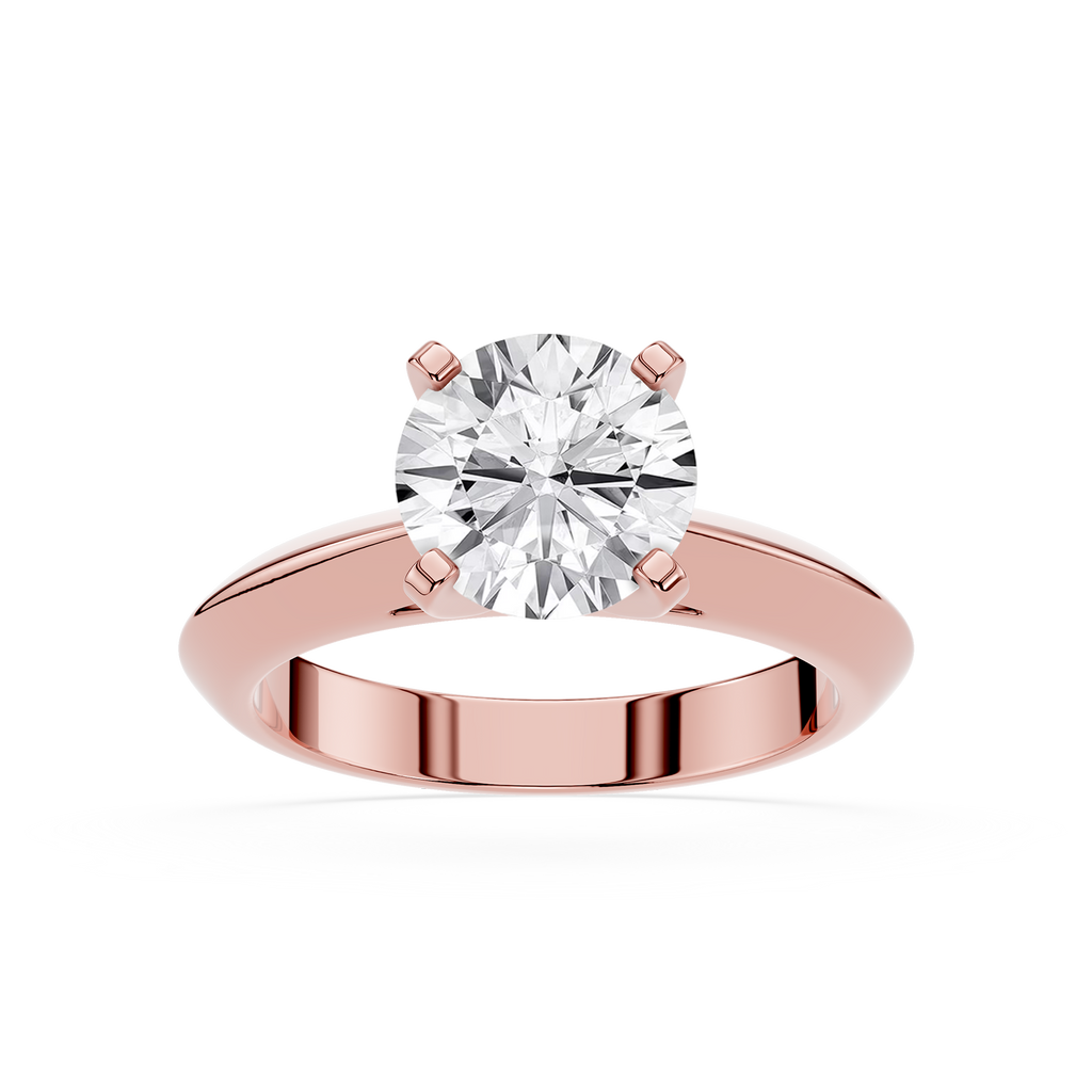 Rose gold ring with a large diamond on a white background
