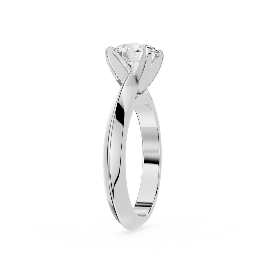 Silver ring with a diamond on a white background