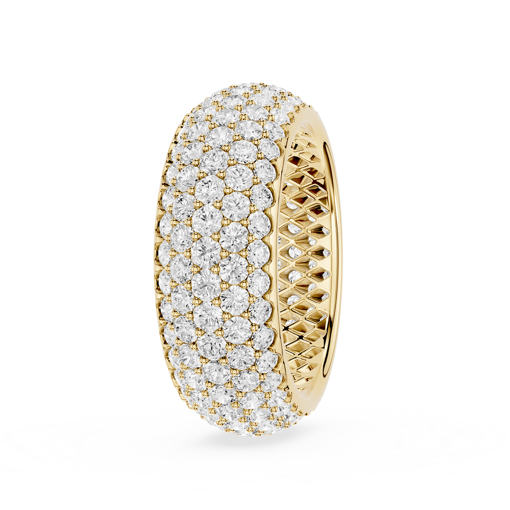 Gold ring with diamond accents on a white background