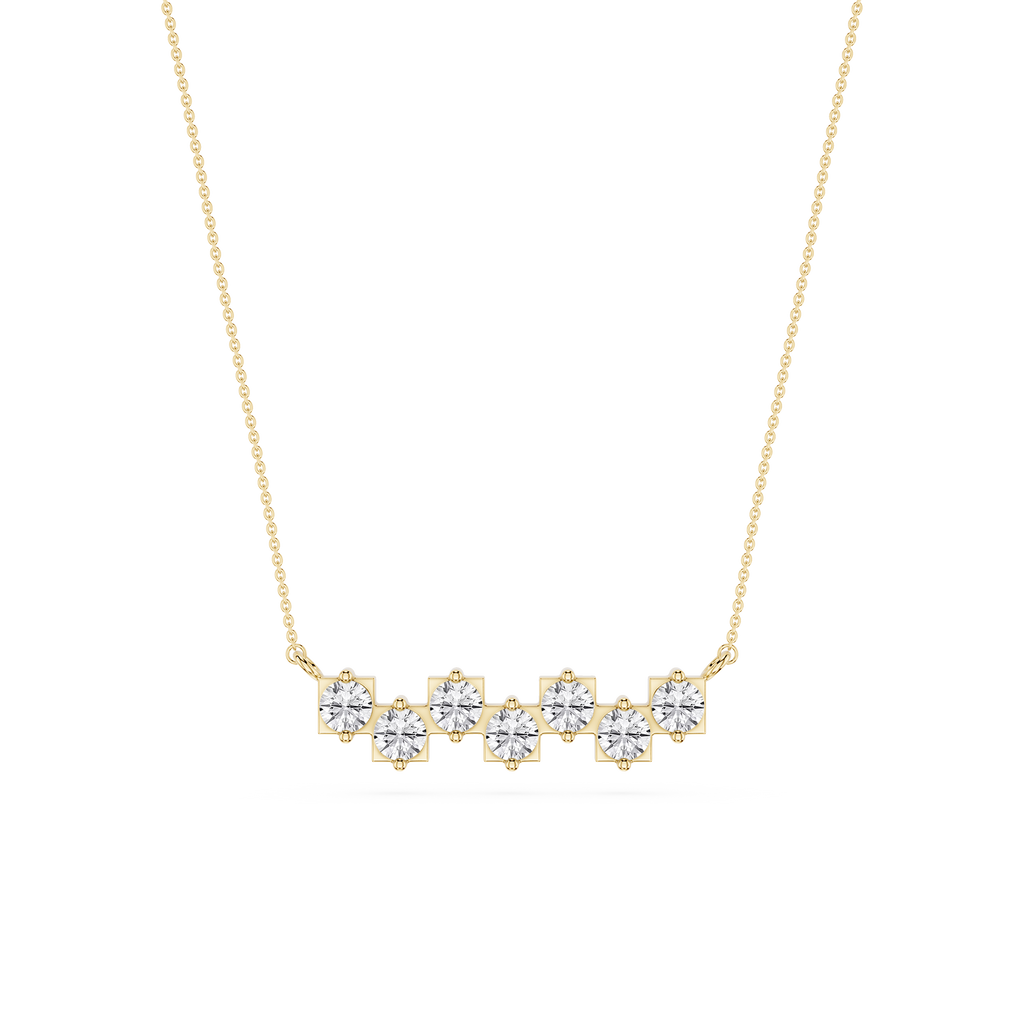Gold necklace with diamond-like stones on a white background