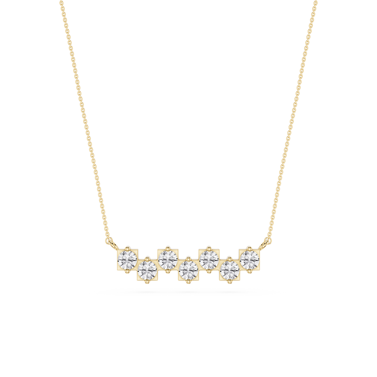 Gold necklace with diamond-like stones on a white background