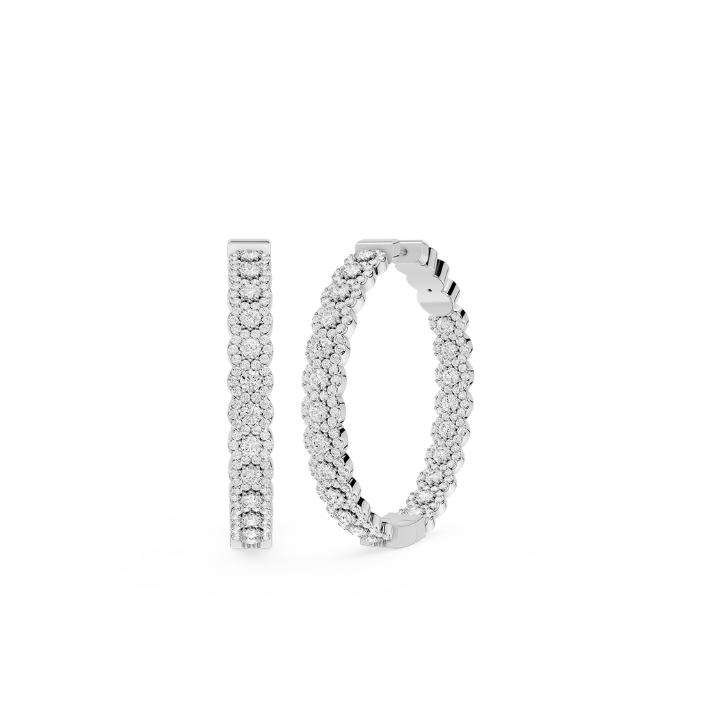 Pair of silver hoop earrings on a white background