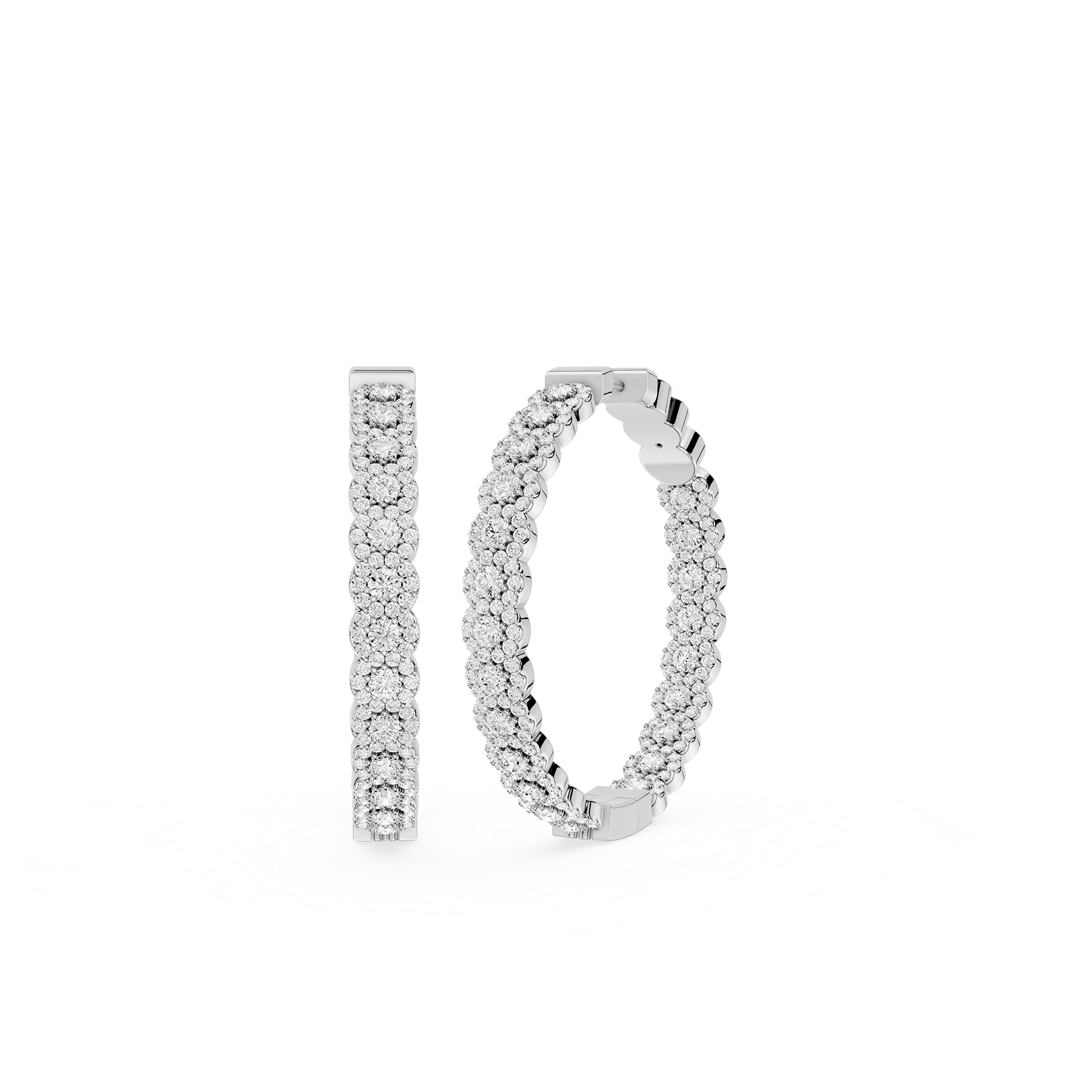 Pair of silver hoop earrings on a white background