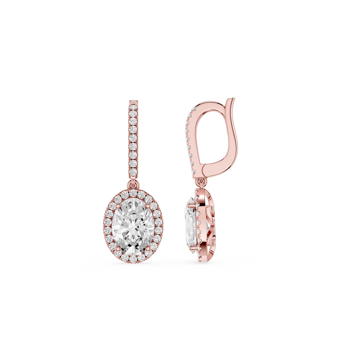 Rose gold earrings with clear gemstones on a white background