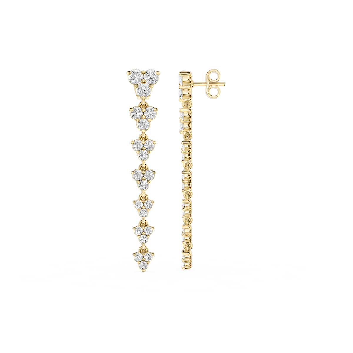 Gold and diamond earrings on a white background