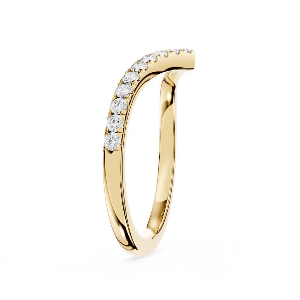 Gold ring with small diamonds on a white background