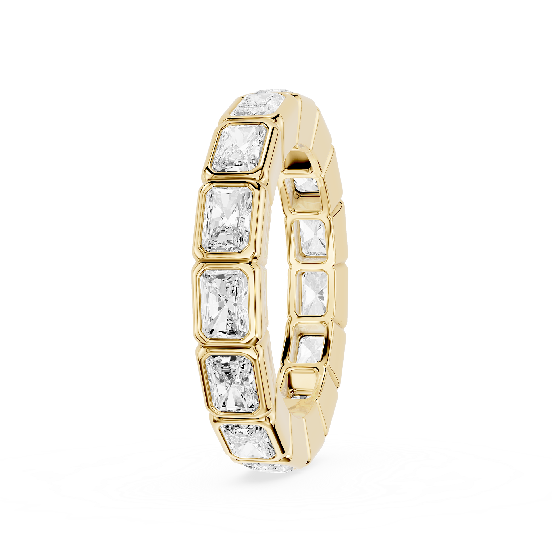 A yellow gold eternity ring featuring a continuous row of baguette-cut clear gemstones in a bezel setting, shown on a plain white background.