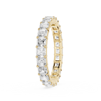 A rose gold eternity ring featuring a continuous row of clear baguette-cut gemstones, shown on a clean white background.