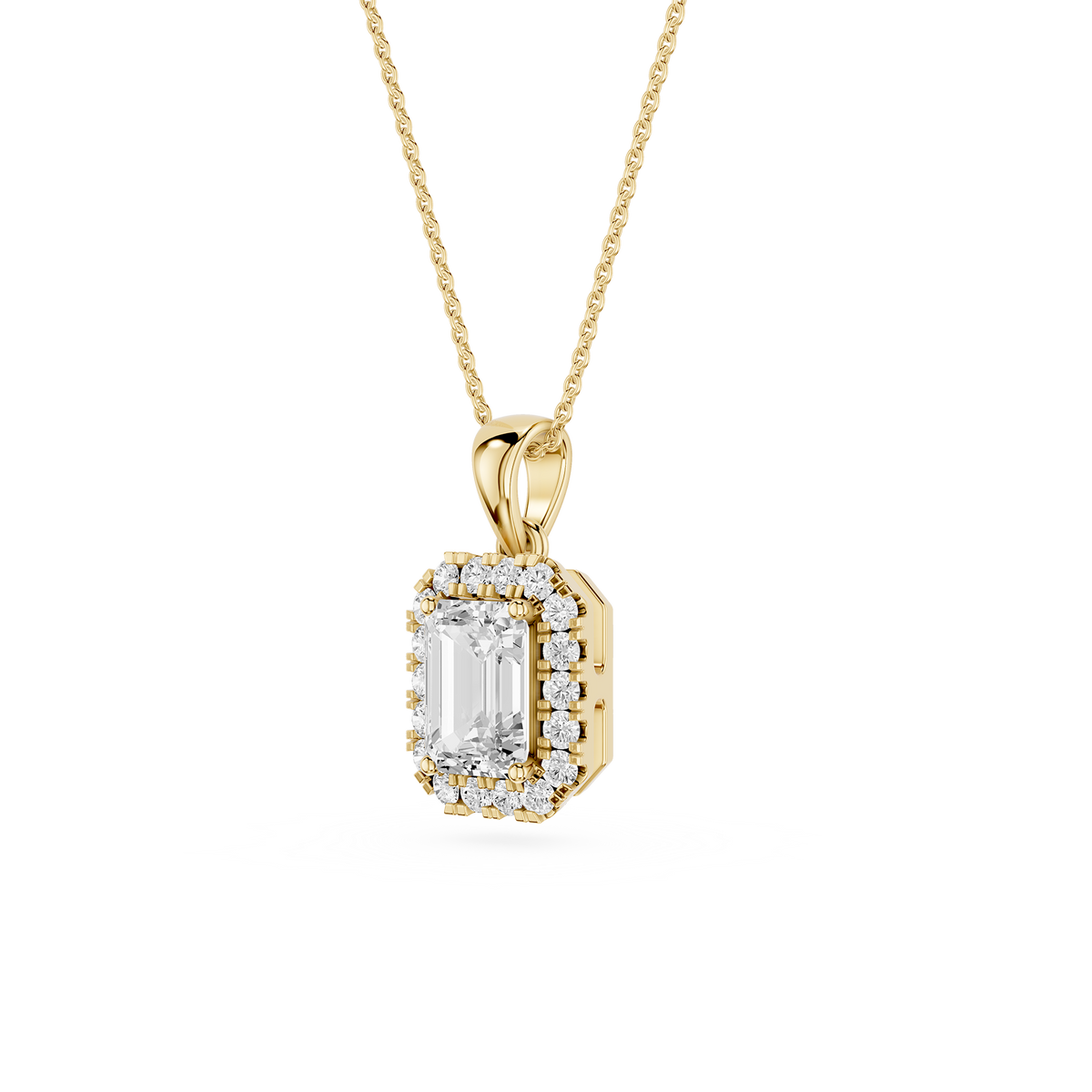 Gold pendant with a diamond on a white background