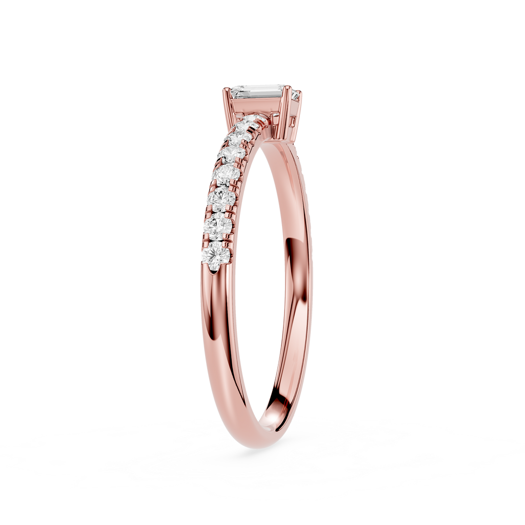 Rose gold ring with diamonds on a white background