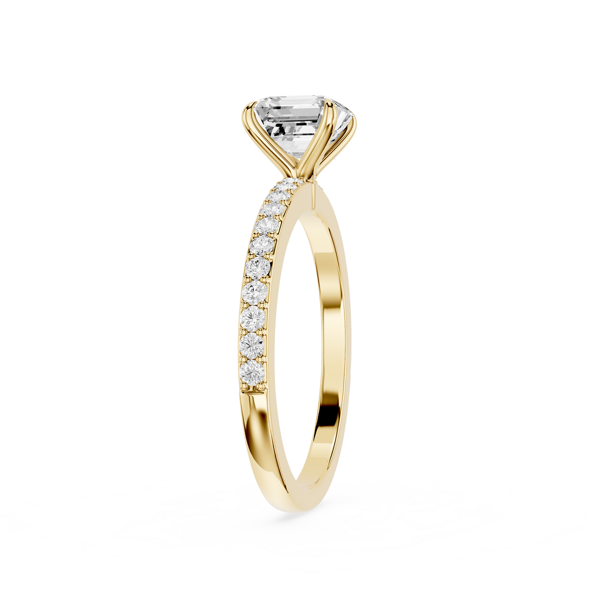 A yellow gold engagement ring featuring a large rectangular emerald-cut diamond center stone and a pavé band set with small round diamonds, shown on a plain white background.
