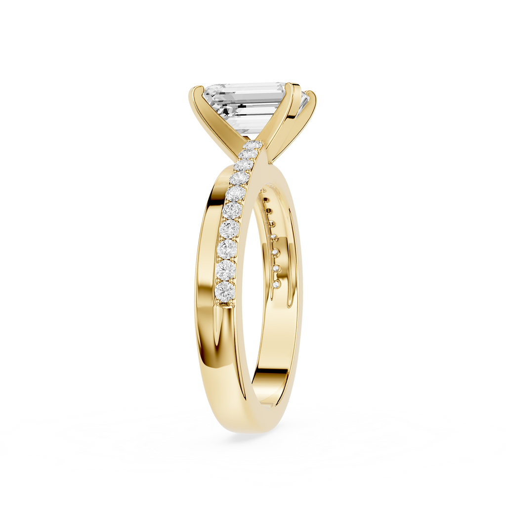 Gold ring with a diamond on a white background