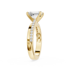Gold ring with a diamond on a white background